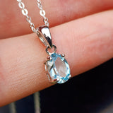 925 Sterling Silver & Sky Blue Topaz Small Clawed Oval Pendant Necklace