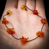 Polished Cognac Baltic Amber 3x Setting Knotted Bracelet