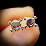 Childrens 925 Sterling Silver & Red CZ Skull & Crossbones Stud Earrings