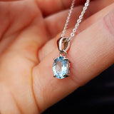 925 Sterling Silver & Sky Blue Topaz Small Clawed Oval Pendant Necklace